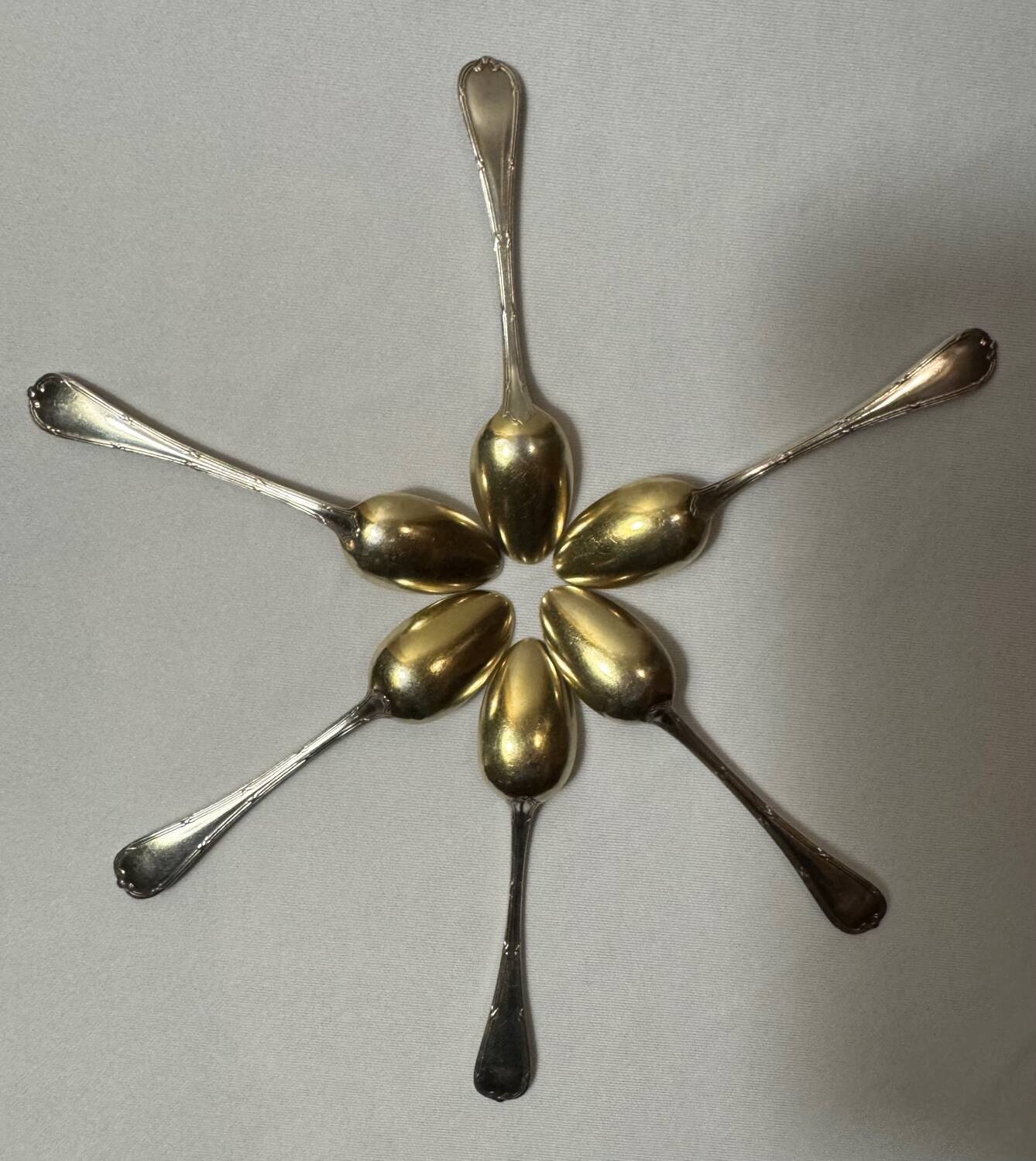 Six Christofle teaspoons, silver-plated vermeil