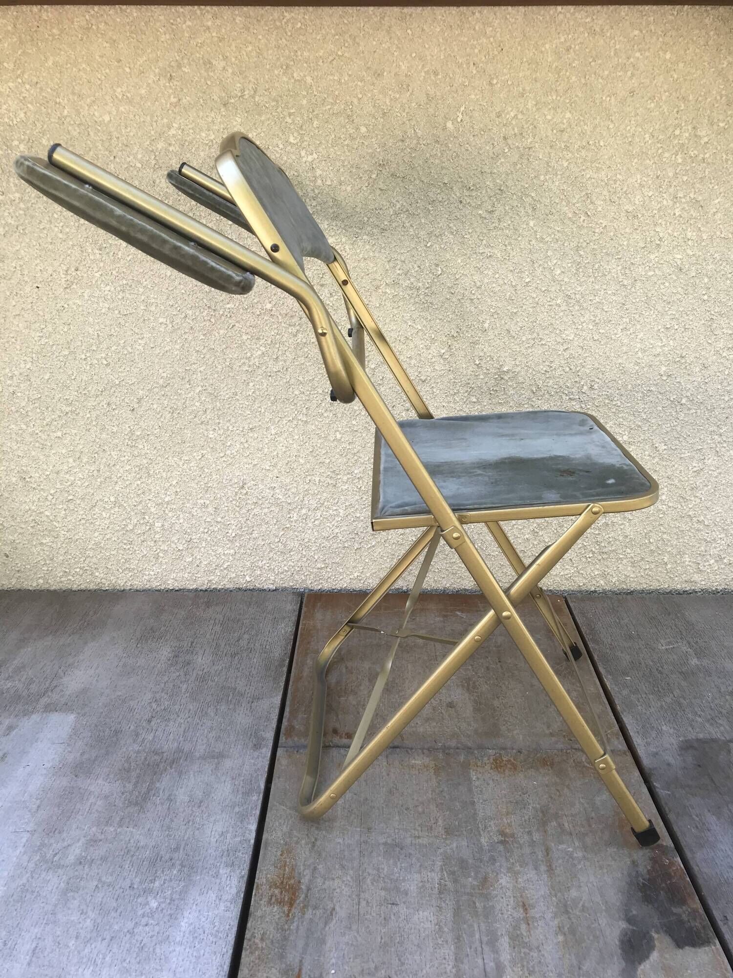 Former Lafuma gold metal folding chair