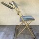 Former Lafuma gold metal folding chair