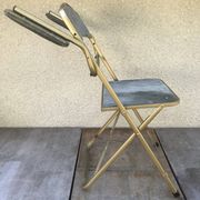 Former Lafuma gold metal folding chair