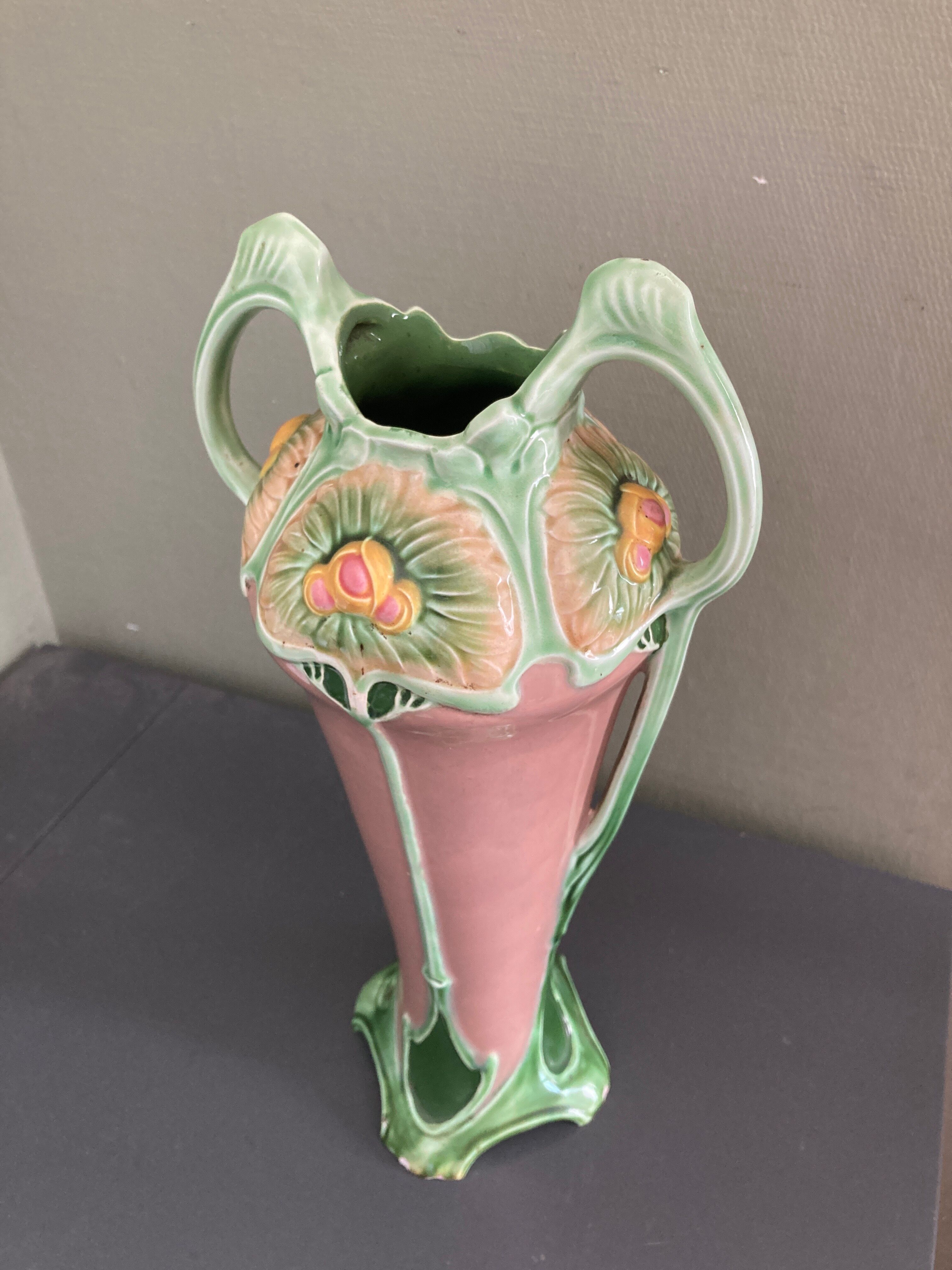 Art-nouveau splashy ceramic vase of flowers