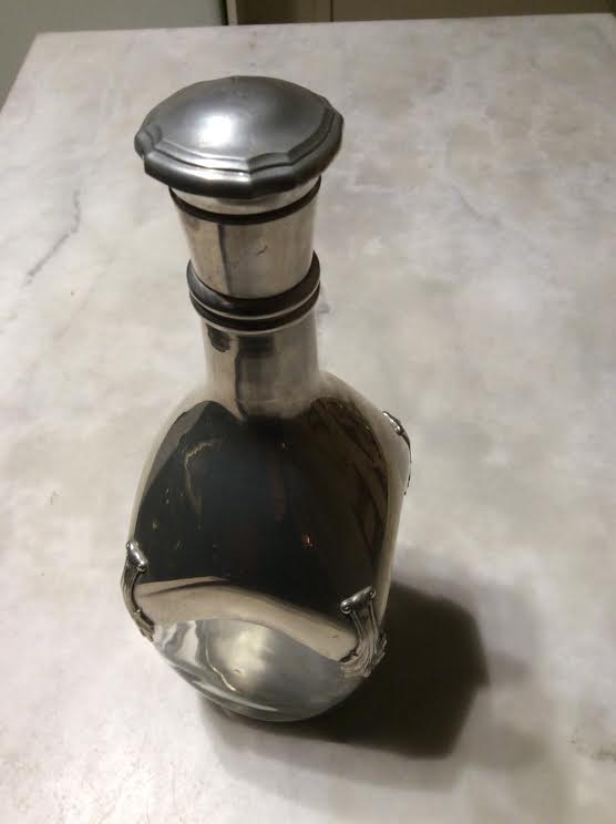 Glass and tin carafe