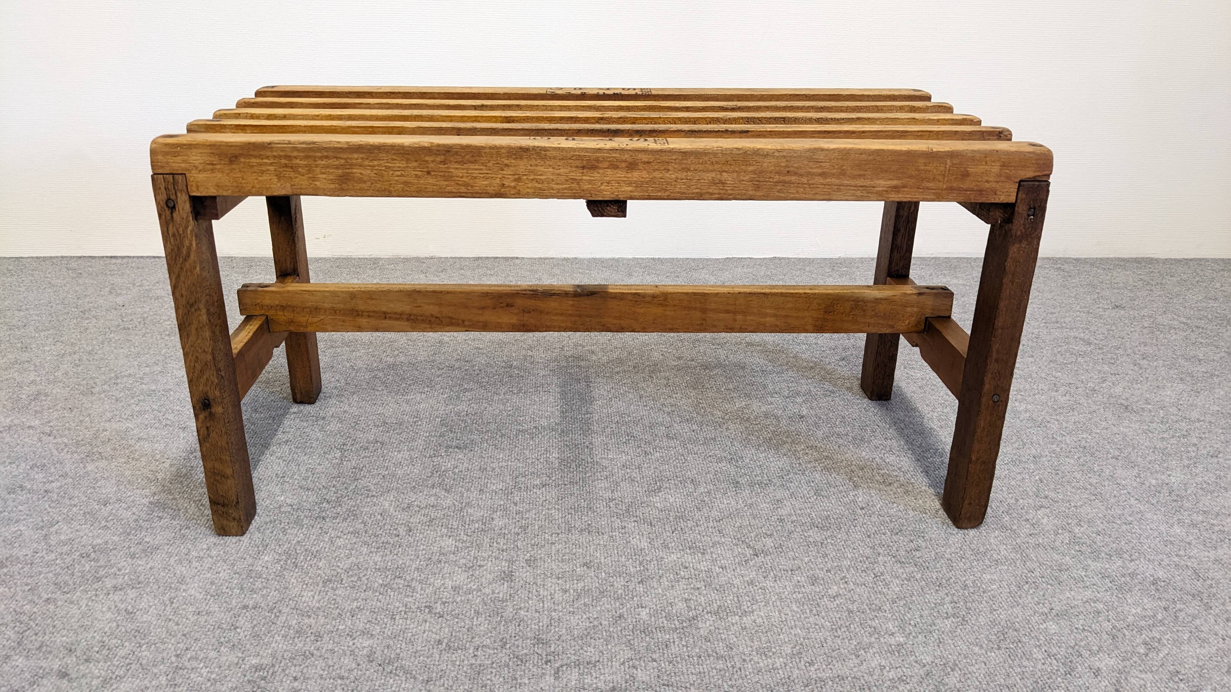 Wooden slatted display bench or support, France circa 1960.