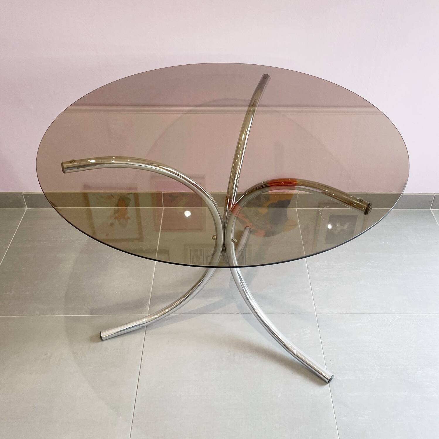 Chromed metal and smoked glass table