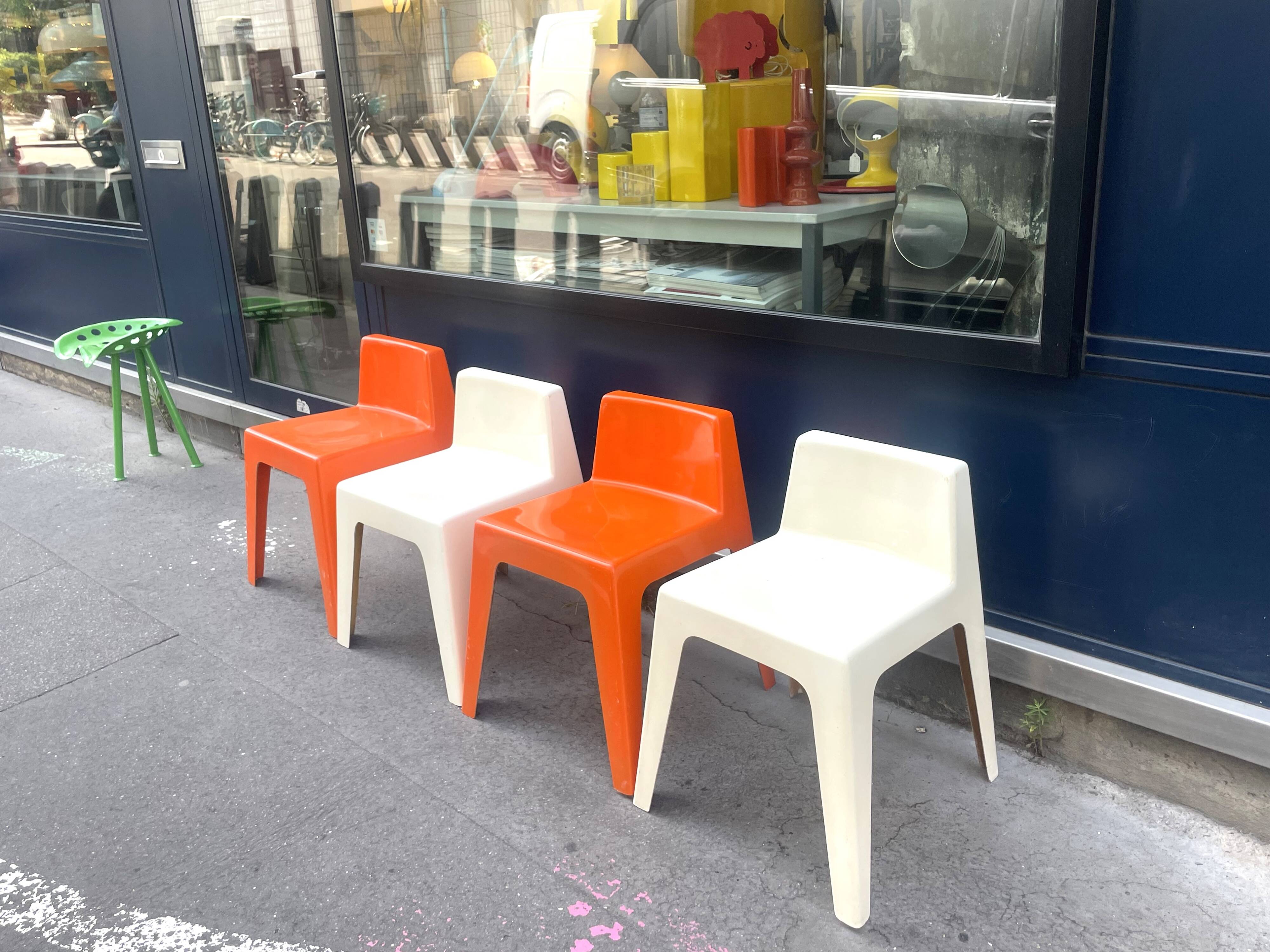 Two white fiberglass Kostka chairs 1970