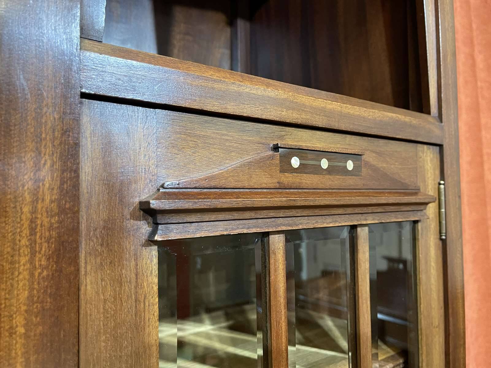 Art Nouveau mahogany buffet with clock in the style of G. Serrurier Bovy.