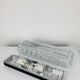 Rectangular wall lamp in molded glass and black metal from the 60s