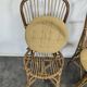 Set of 3 chairs and a rattan armchair.