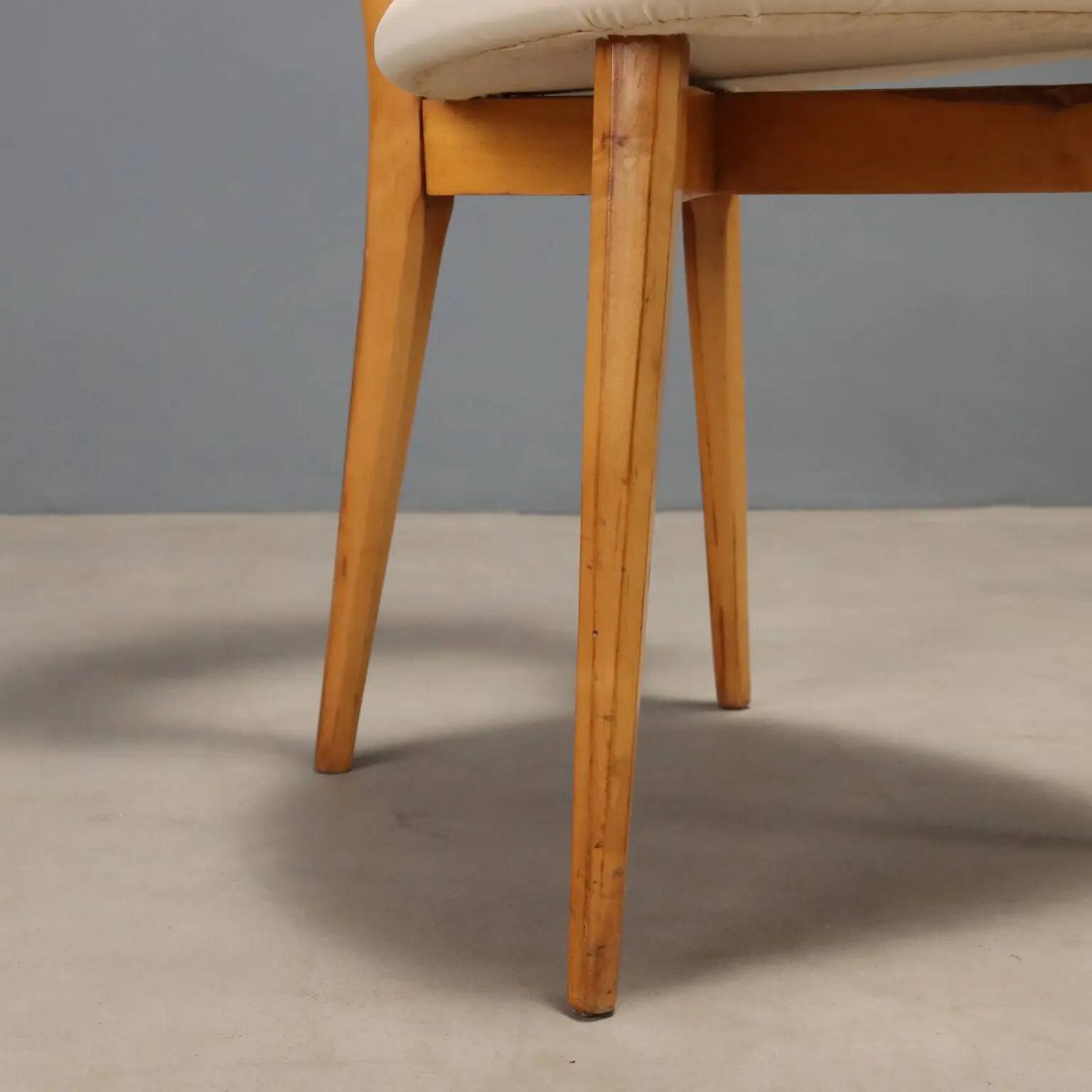 Beech chairs with faux leather from the 1960s.