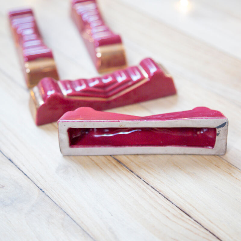 4 red and gold art deco ceramic knife holders