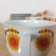 Orange flower tea service, porcelain, 7 cups 1970