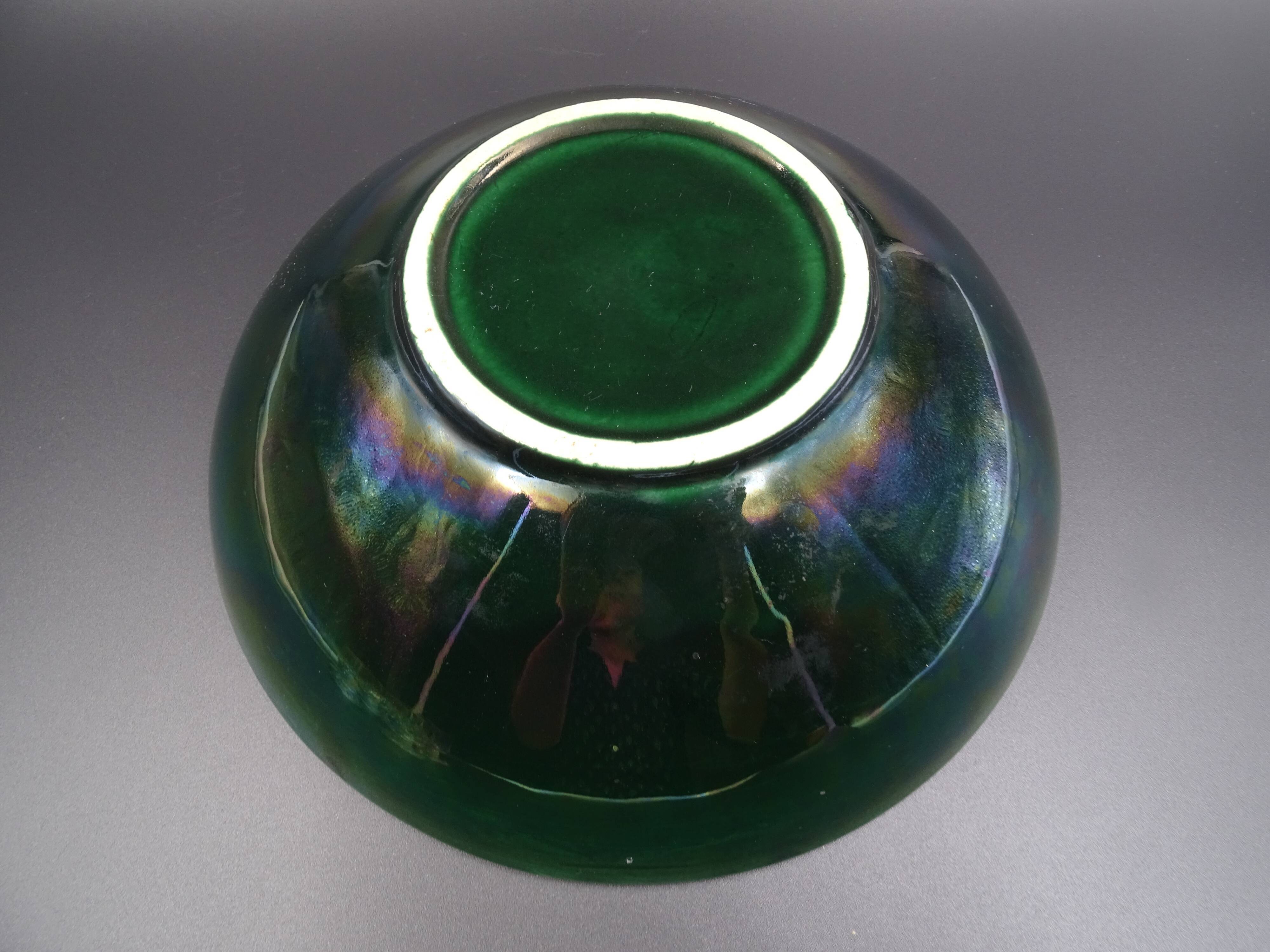 Green faience bowl decorated with multicolored drips around 1970