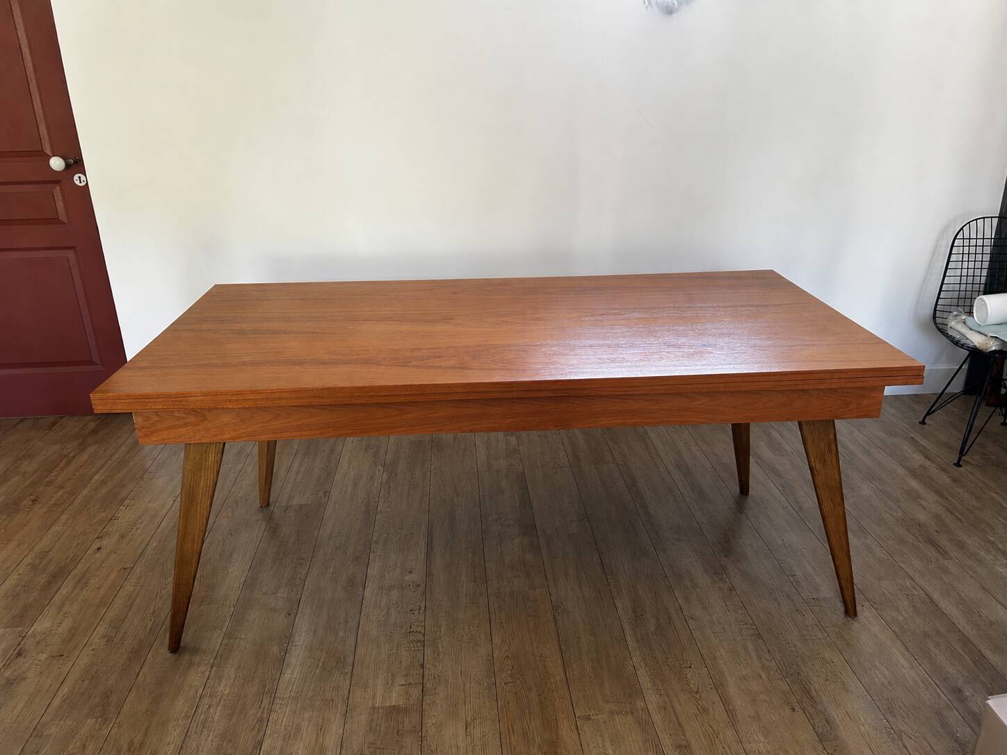 Vintage table with tapered legs.