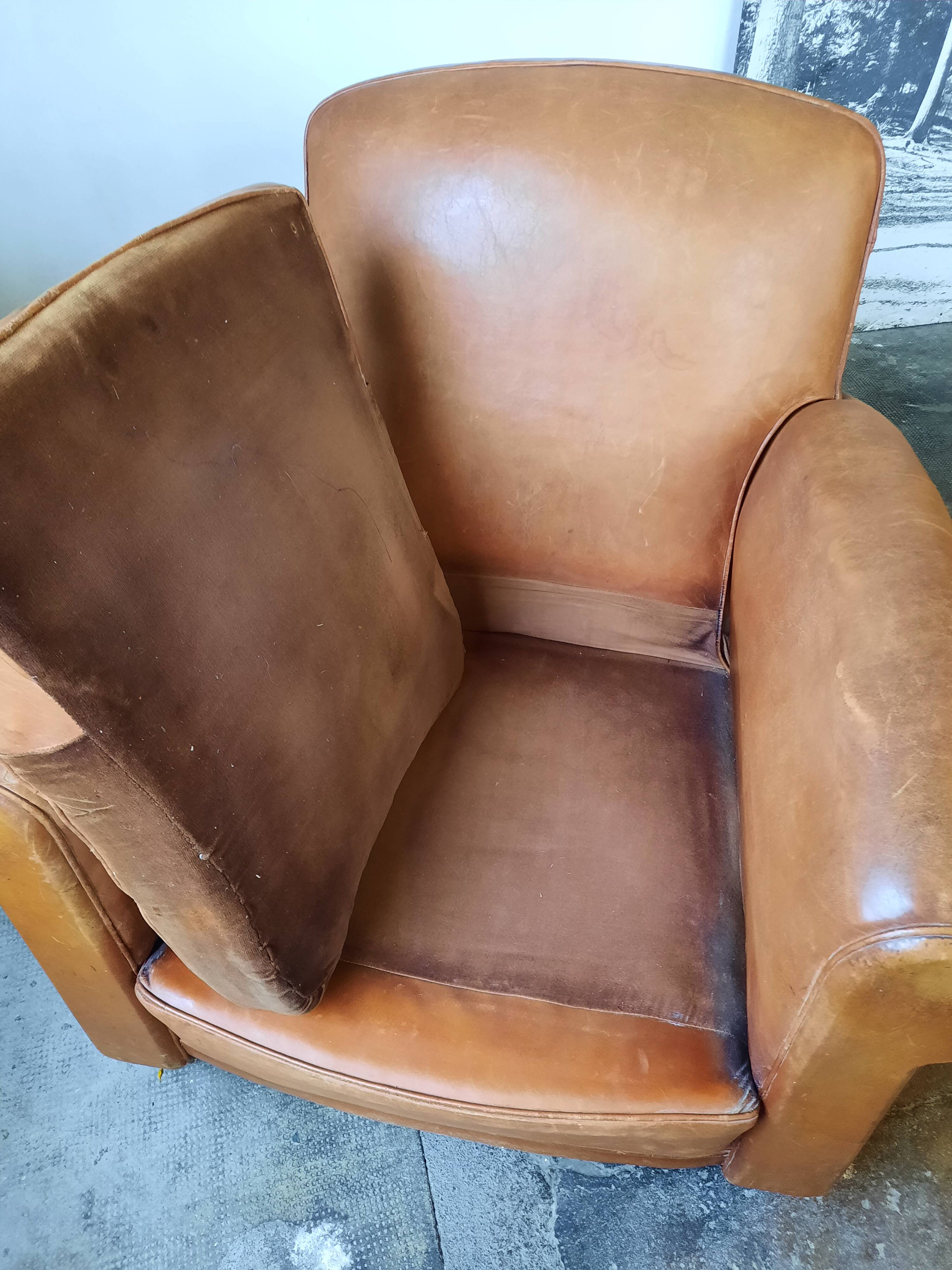 Old leather club chair 1940-1950