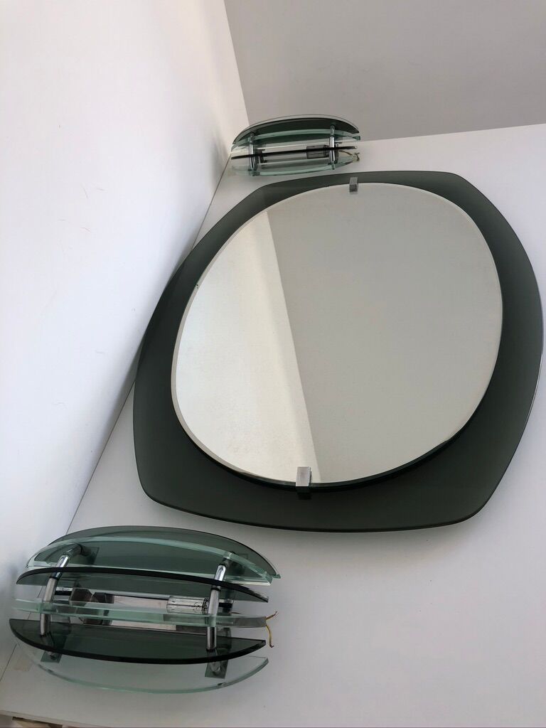 Veca mirror and 2 matching Veca wall lights made in Italy.