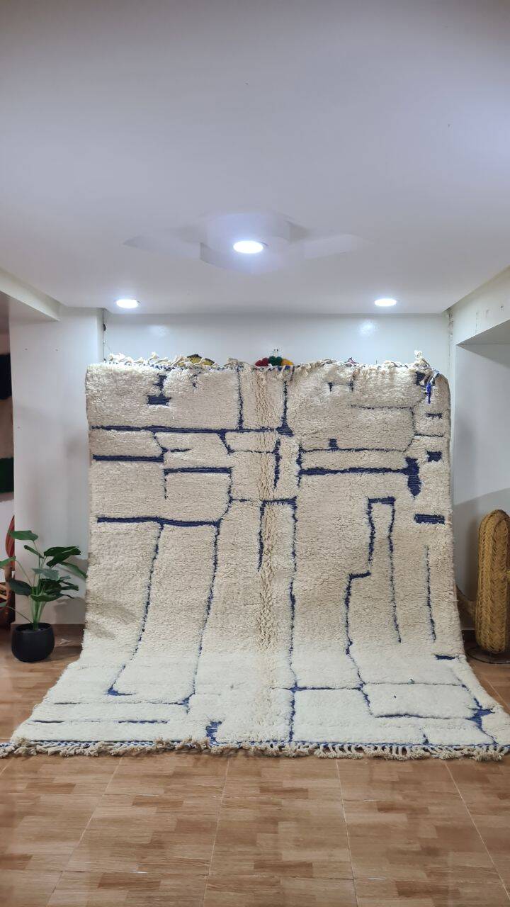 Modern Moroccan Beni Ouarain rug with blue geometric lines