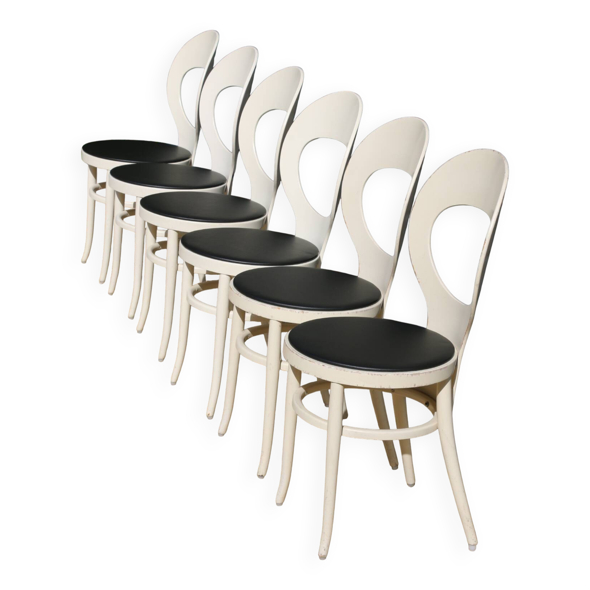 6 baumann chairs, white gull with black faux leather.