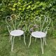 Paire d’anciens fauteuils de jardin en fer forgé