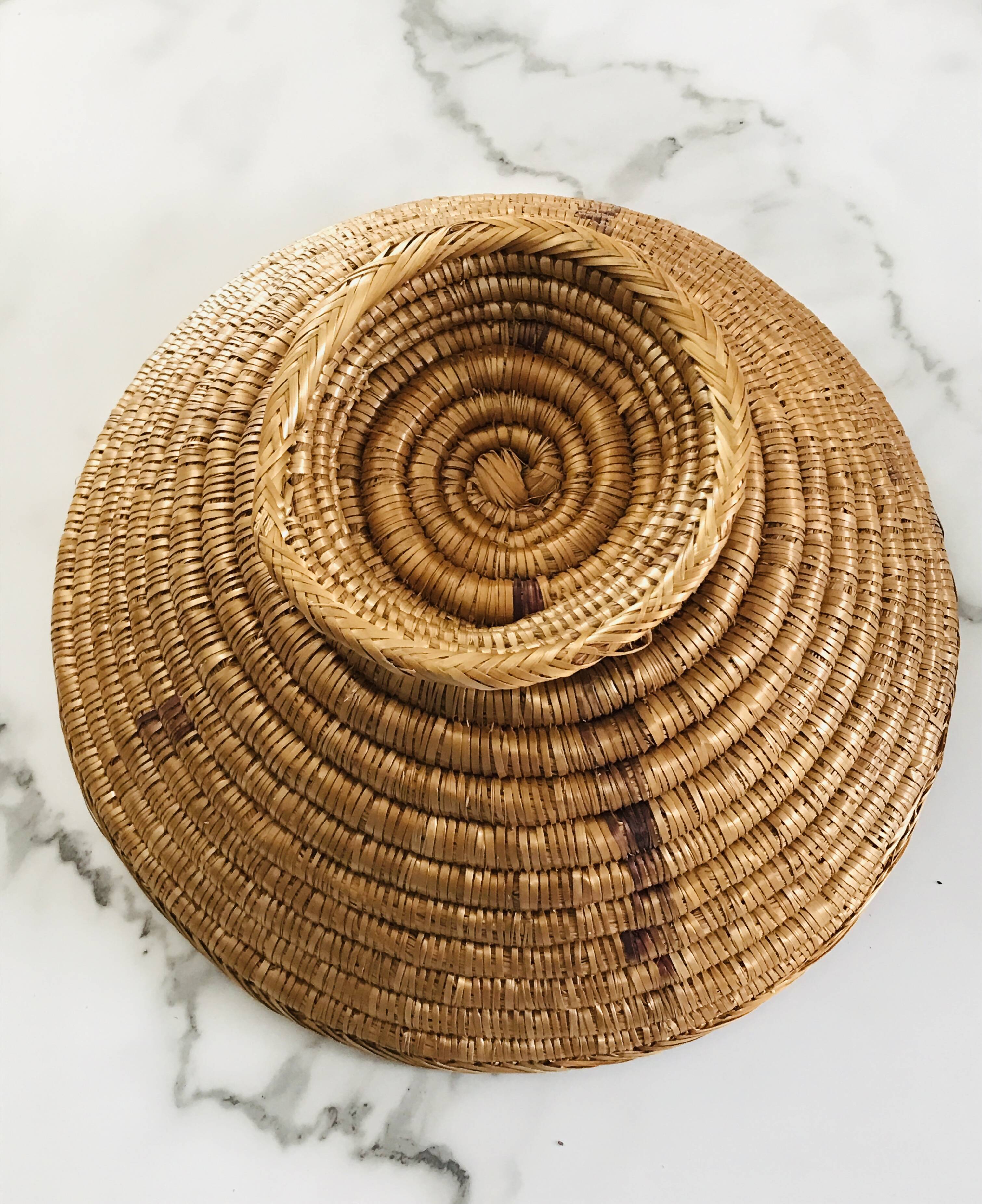 Large bowl on a woven wicker stand