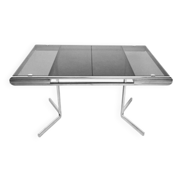 Table with chrome base and smoked glass from the 70s with extensions
