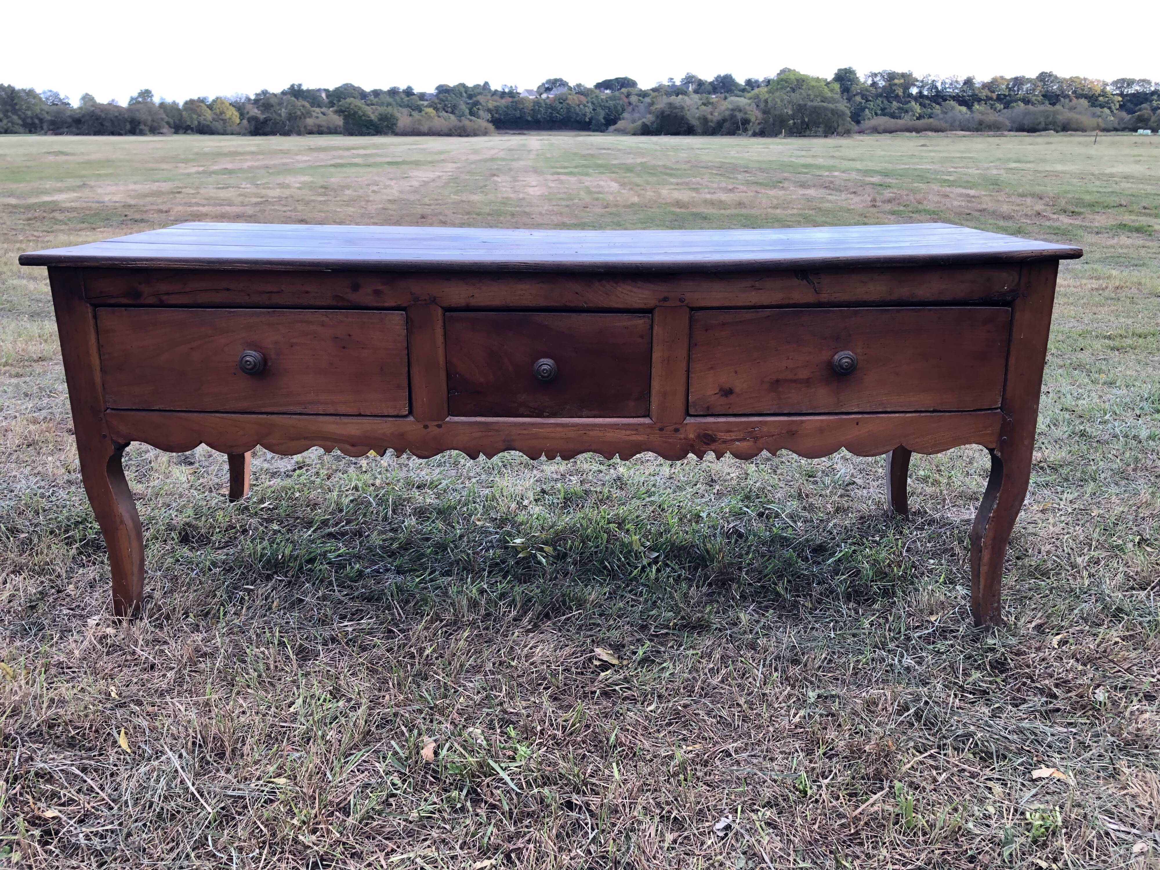 Antique Louis XV paneled table with 3 front drawers in solid cherry wood