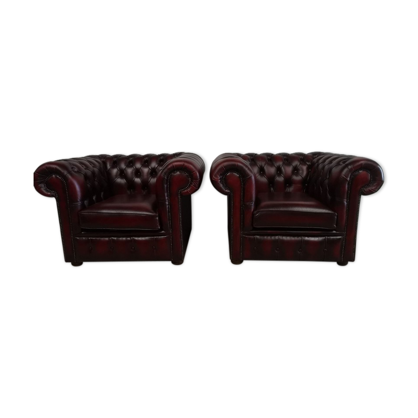 Chesterfield burgundy leather armchairs