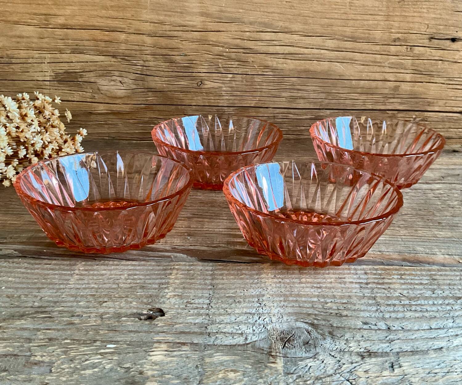 4 pink glass bowls