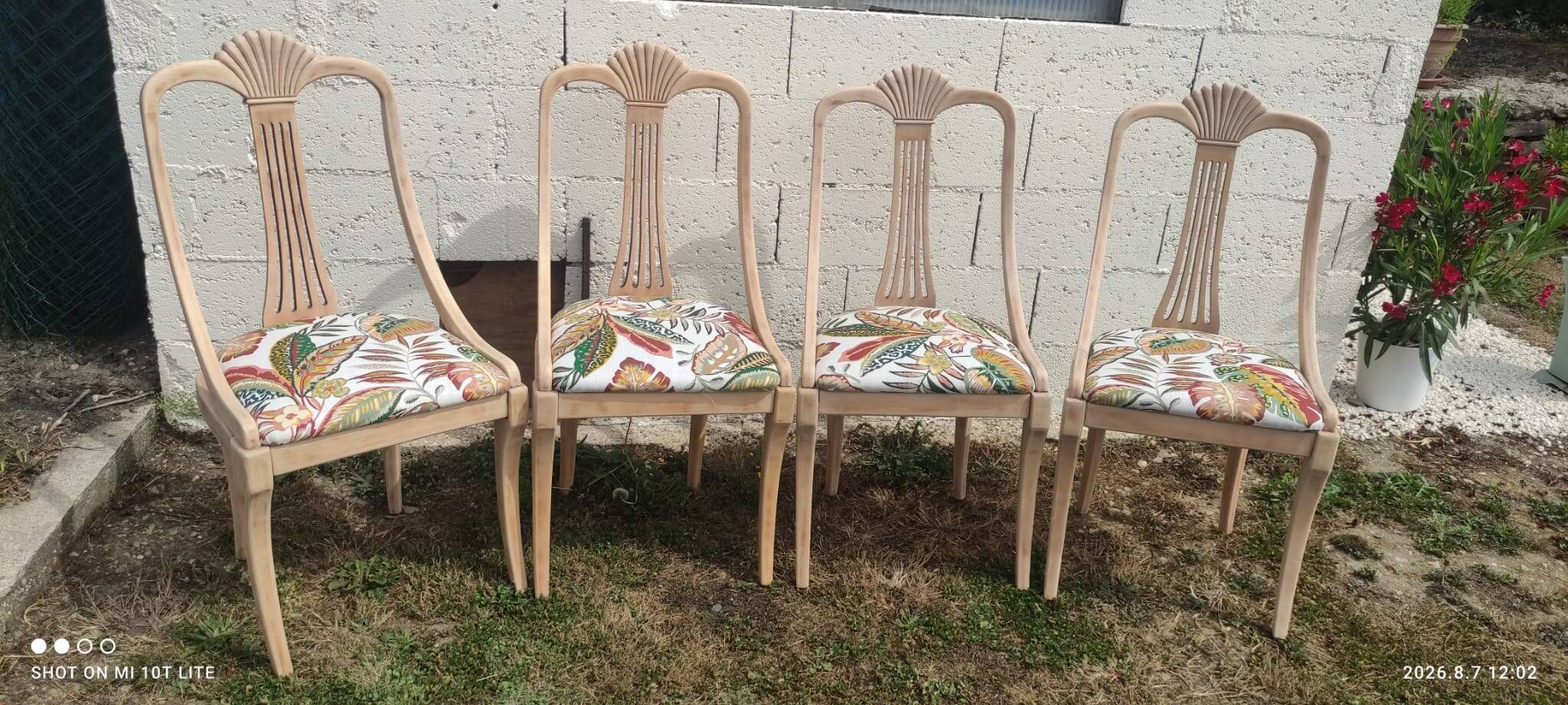 4 vintage wooden chairs sanded and reupholstered.