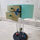 Pair of postmodern Memphis Milano style side tables, 1980s