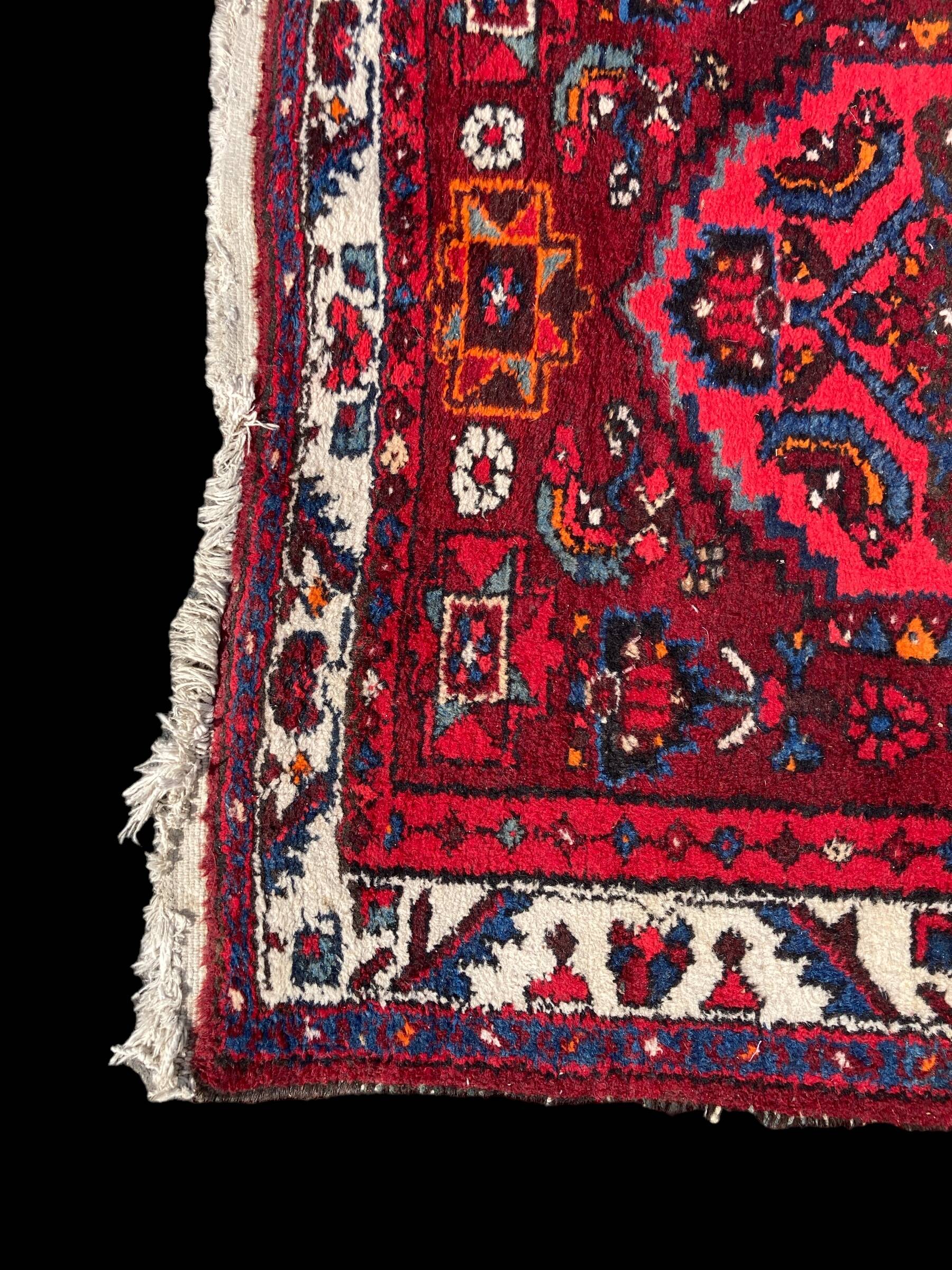 Hand-woven Iranian rug