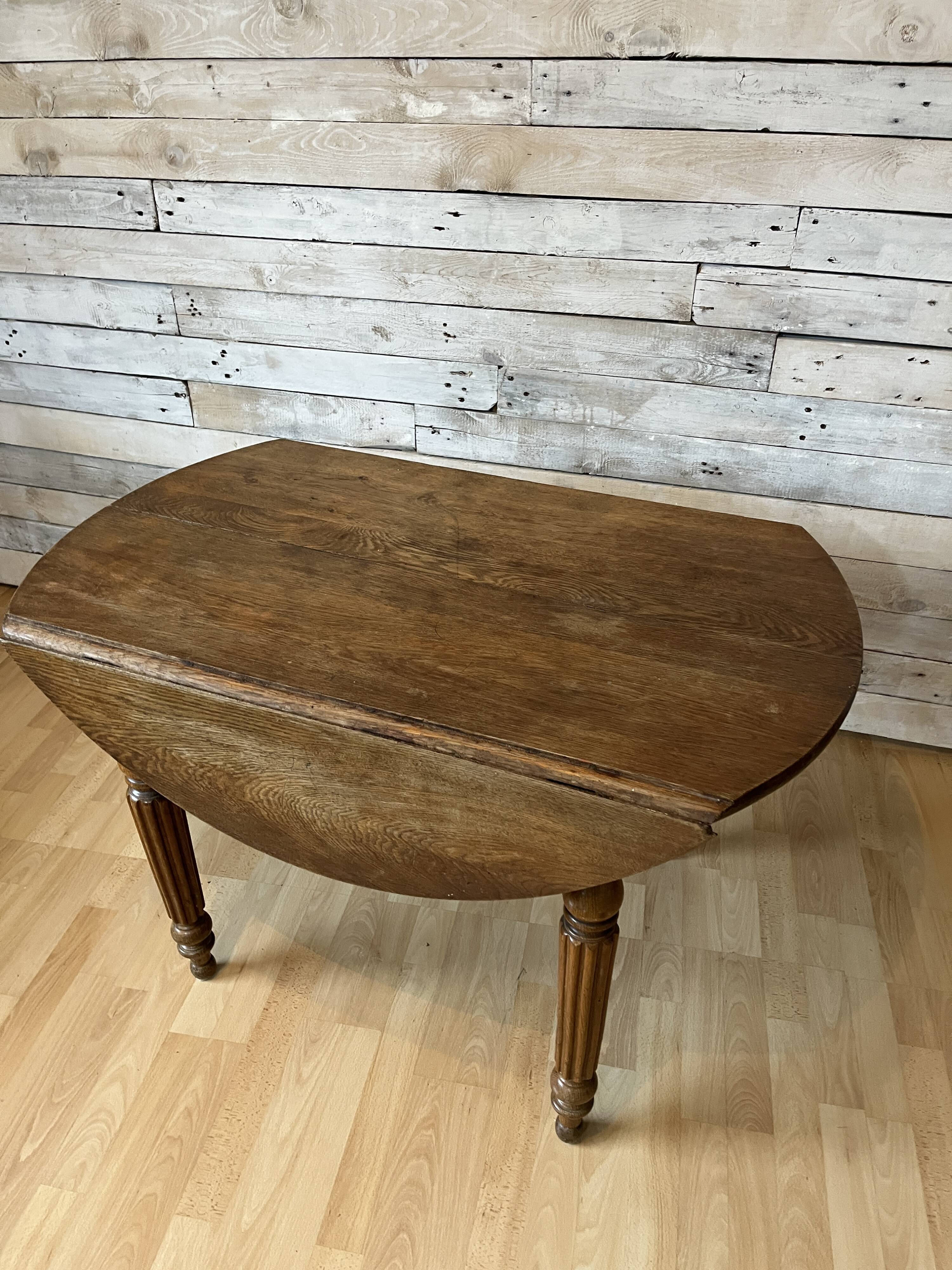 Round table with flaps