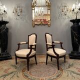 Pair of walnut armchairs from the Louis XVI period around 1770