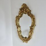 Baroque style wall mirror, in gilded resin, 1960/70