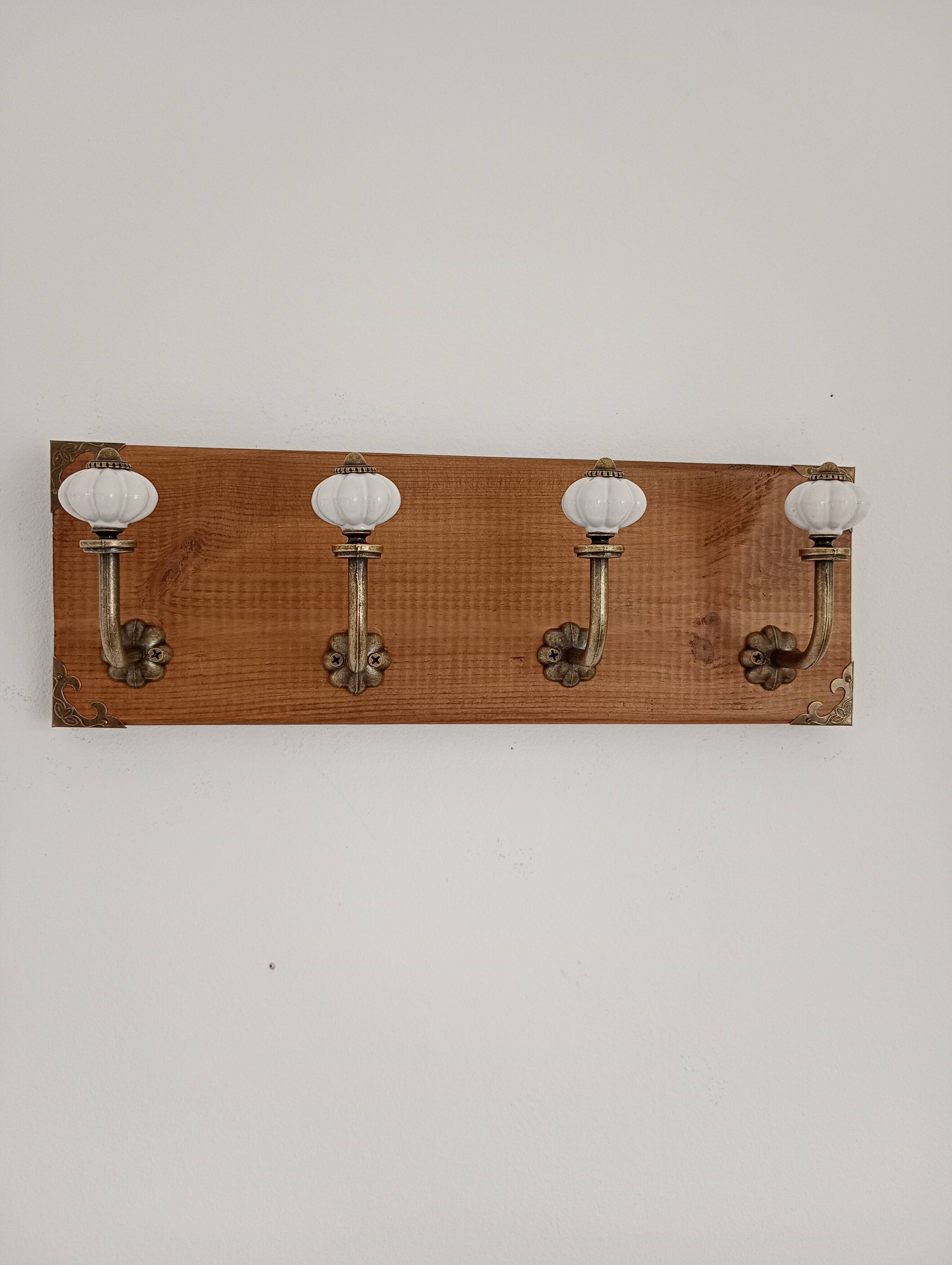 Wall coat rack with 4 metal hooks and white ceramic knobs, handmade.