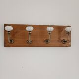 Wall coat rack with 4 metal hooks and white ceramic knobs, handmade.