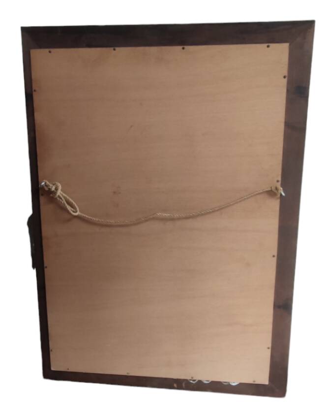 Old beveled mirror with wooden frame