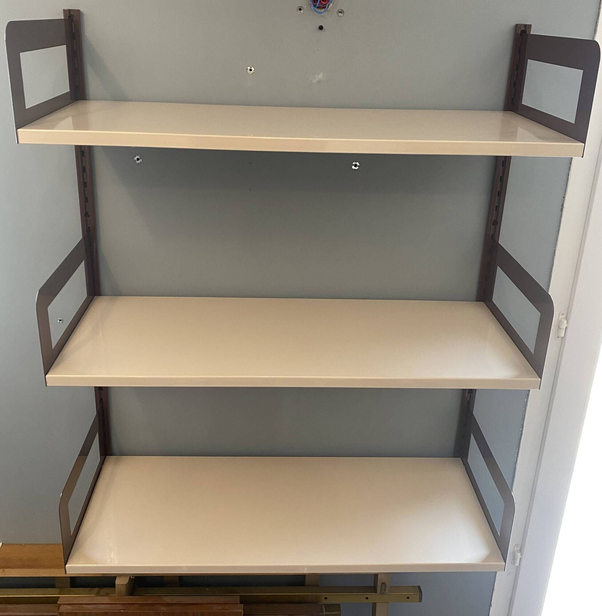 Modular metal wall shelf in brown and beige vintage 70s design.