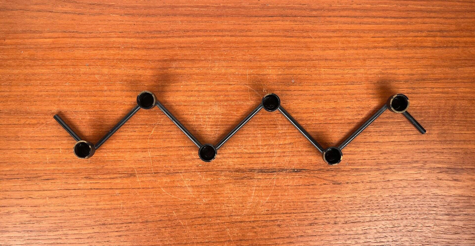 Mid-century Danish minimalist metal candlestick from the 1960s.