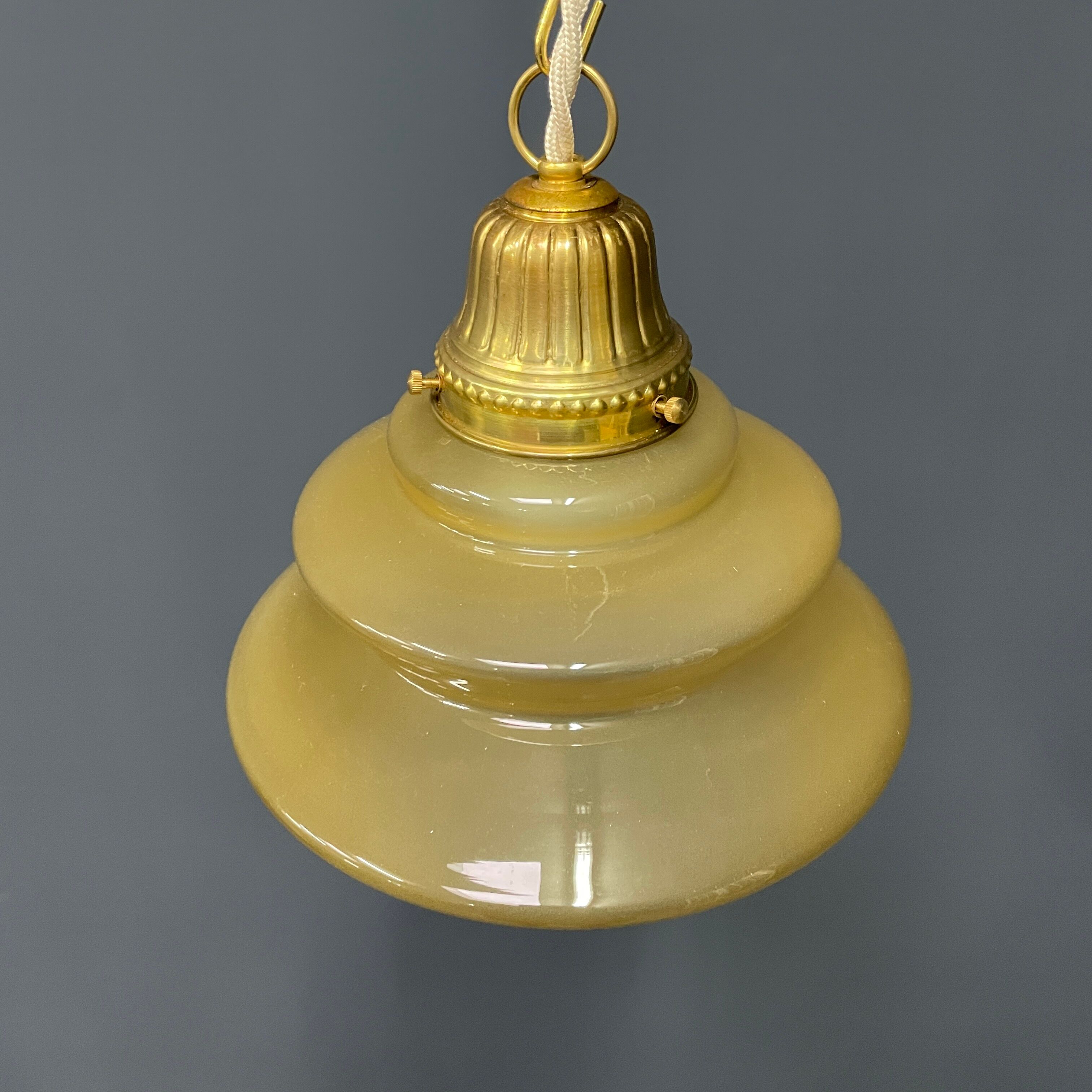Vintage ocher glass hanging lamps with brass gallery