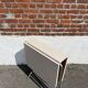 Folding table with chrome and pink formica.