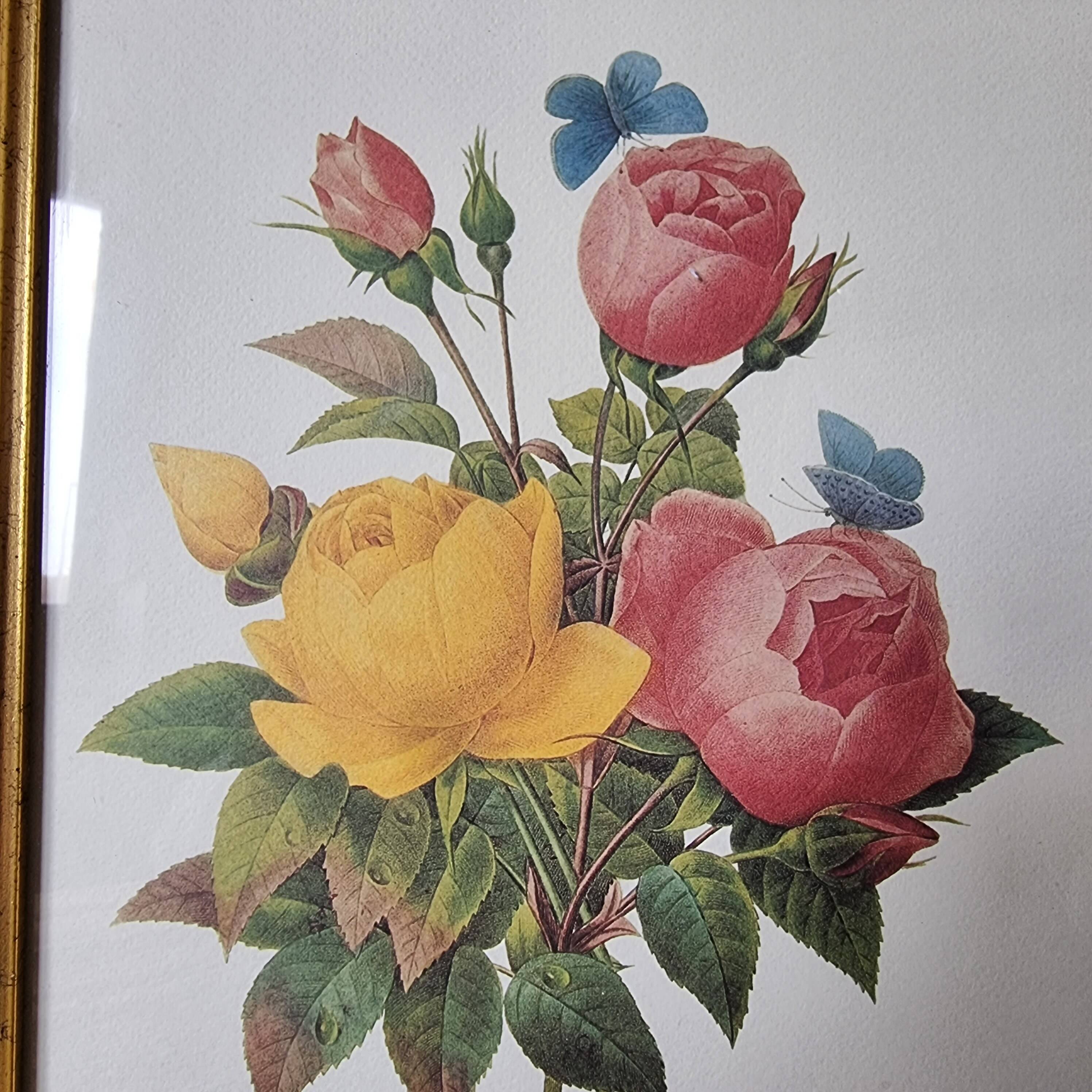 2 paintings with period lithographed flowers and gilded wooden frame.