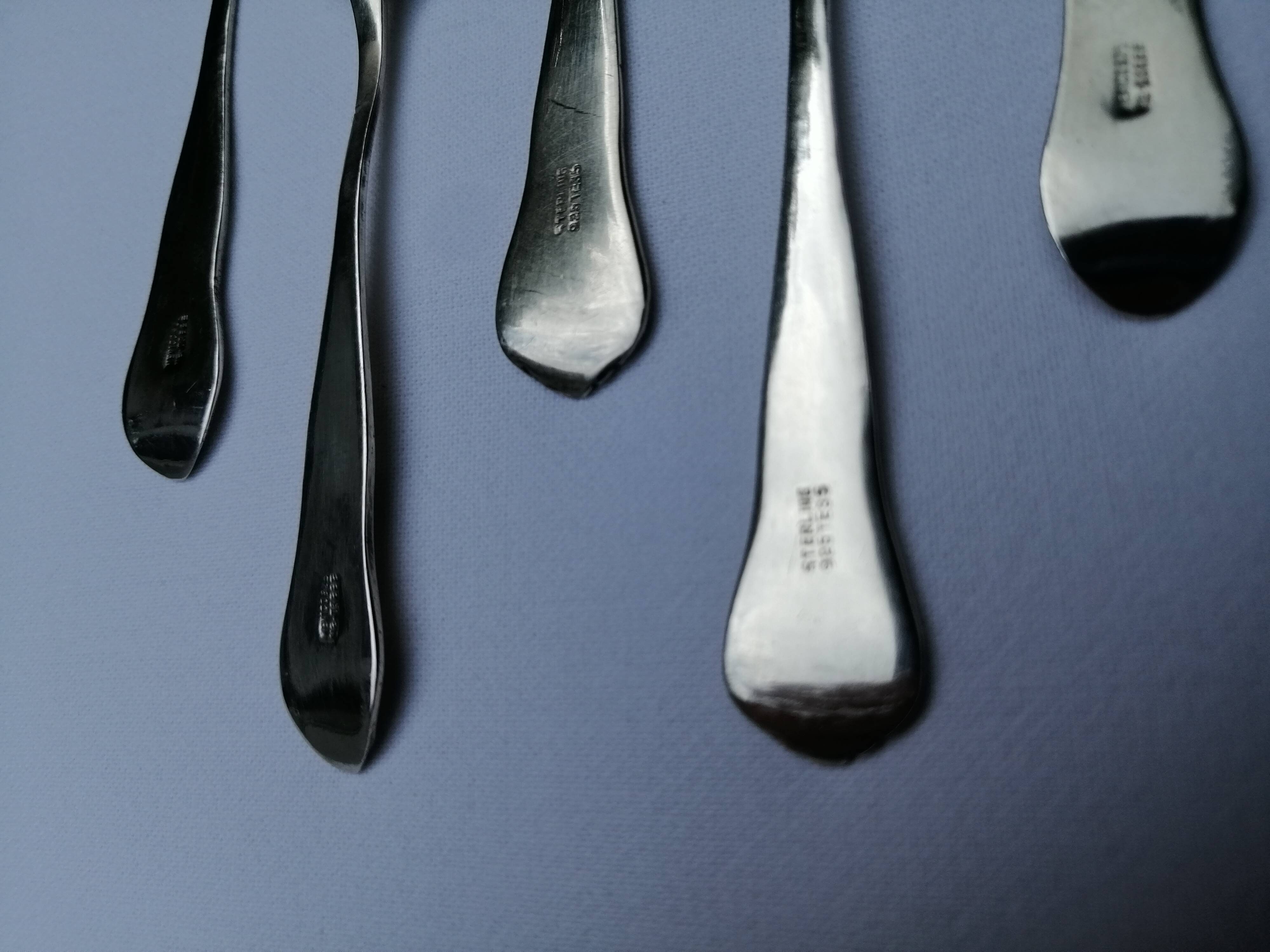 8 small silver spoons