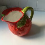 Strawberry-shaped pitcher with a dish