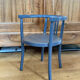 Curved wooden armchair from the late 19th/early 20th century.