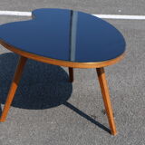 Bean coffee table with black glass top