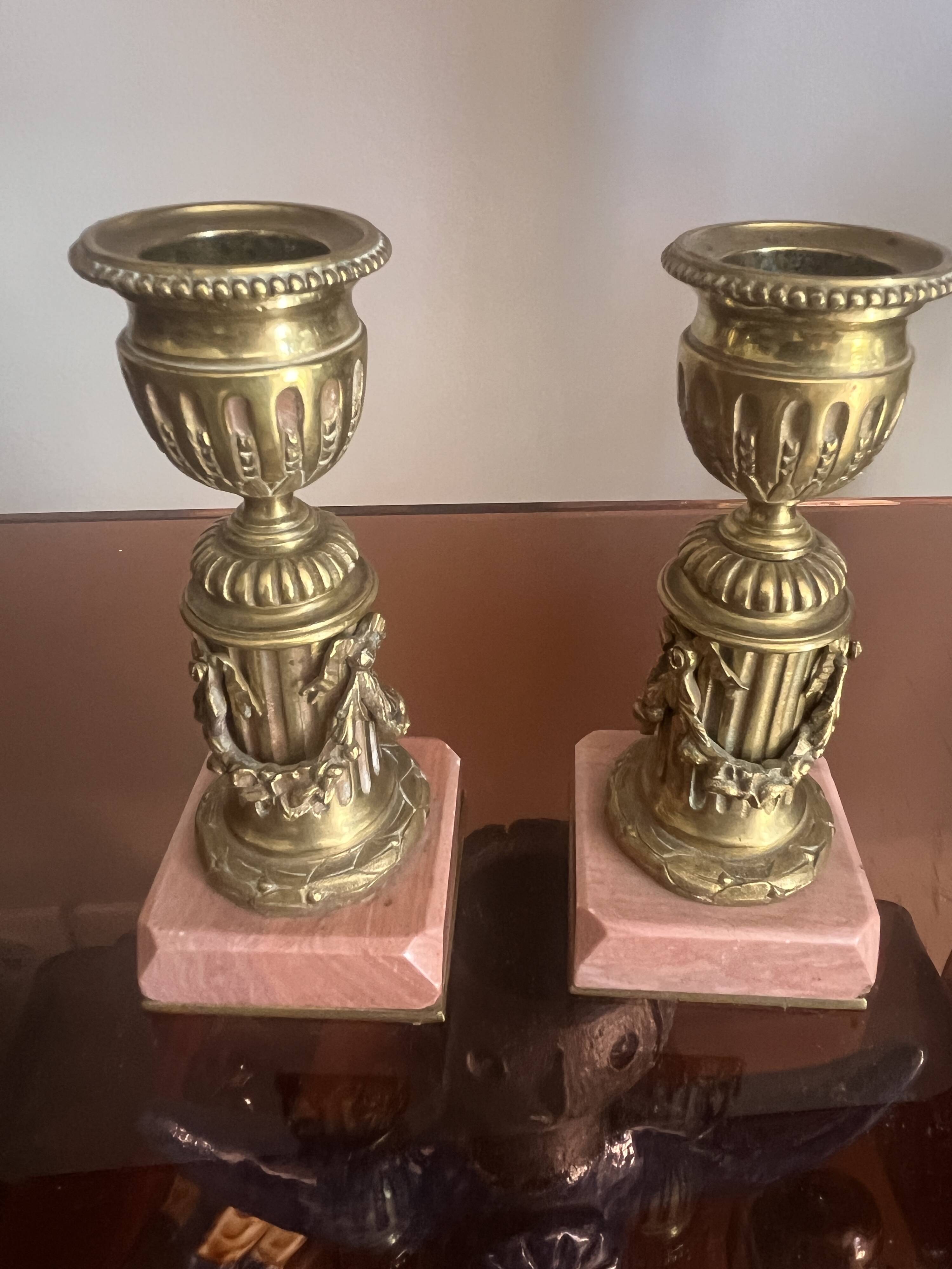 pair of antique bronze candlesticks