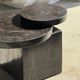 Brown petrified wood coffee table from Indonesia with a double circular top.