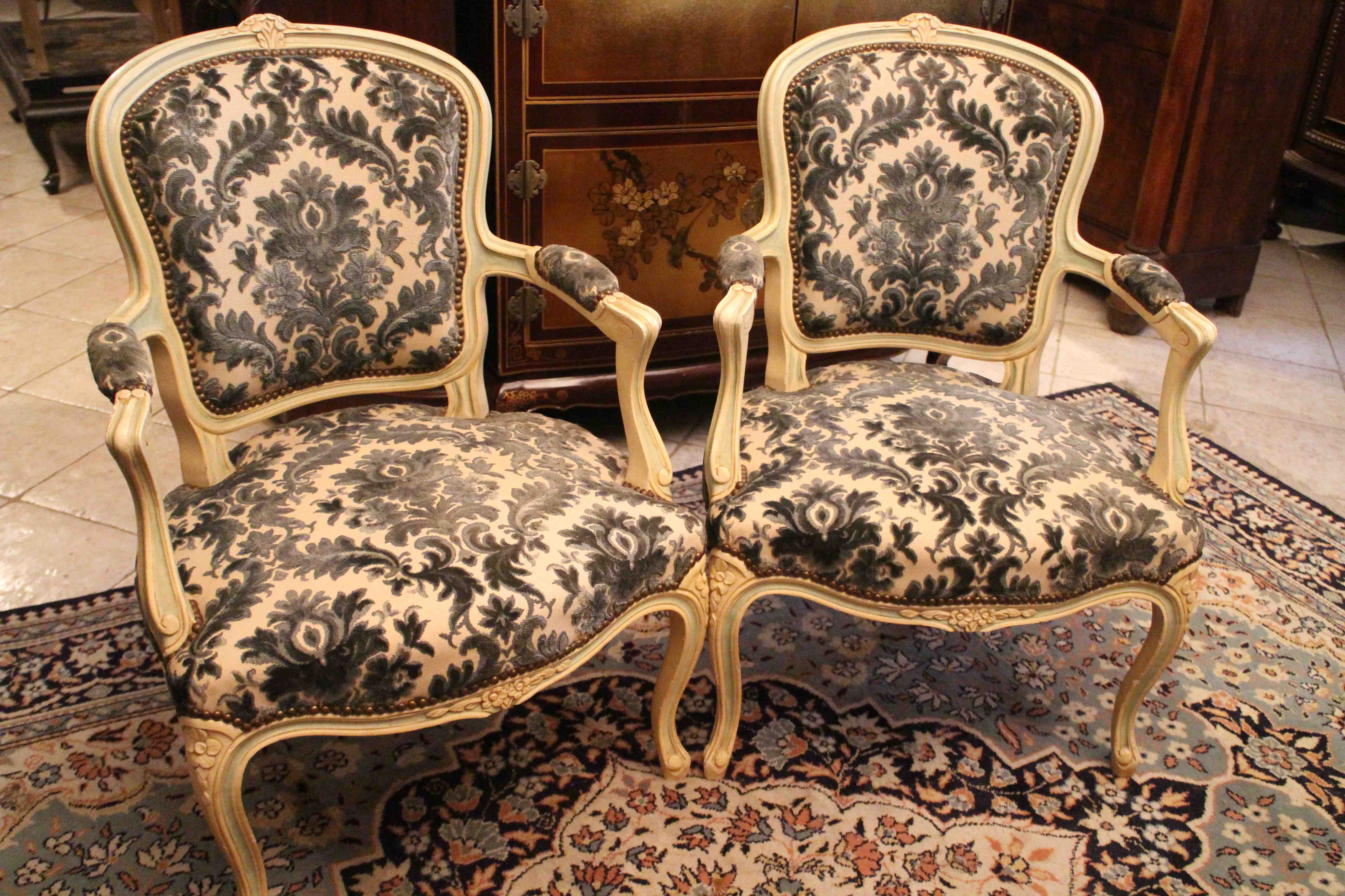 Pair of Louis XV-style convertible armchairs