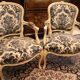 Pair of Louis XV-style convertible armchairs