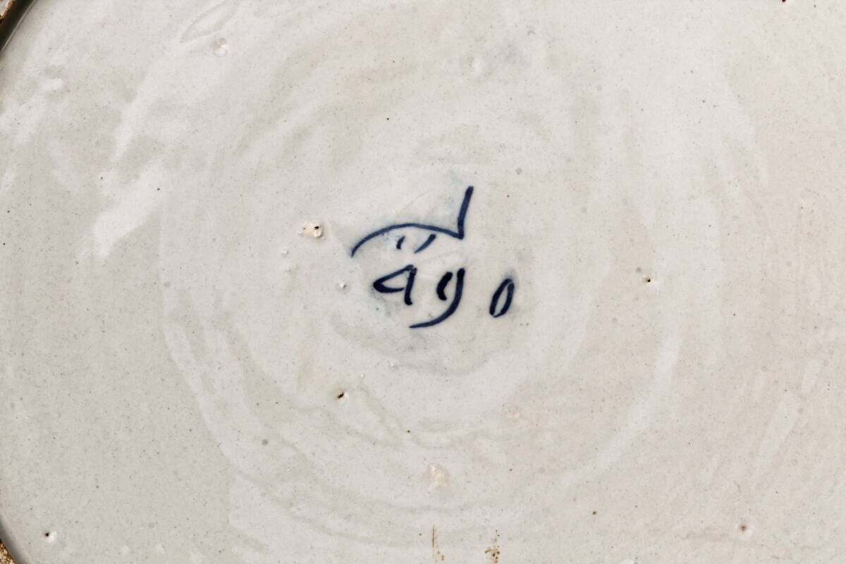 Delft earthenware dish, signed the porcelain label
